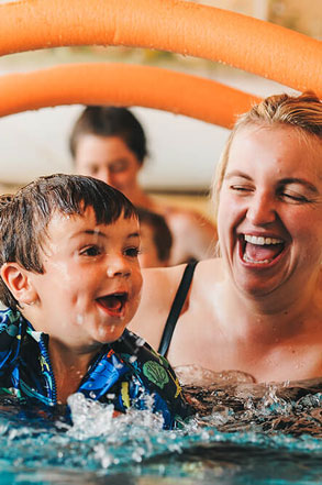 mother and son swiming in the pool