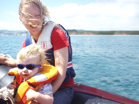 jennie with her son on a boat testimonial