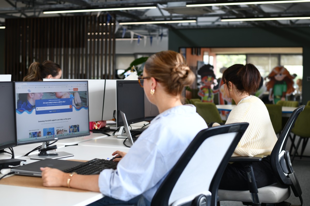 water babies head office staff at computers