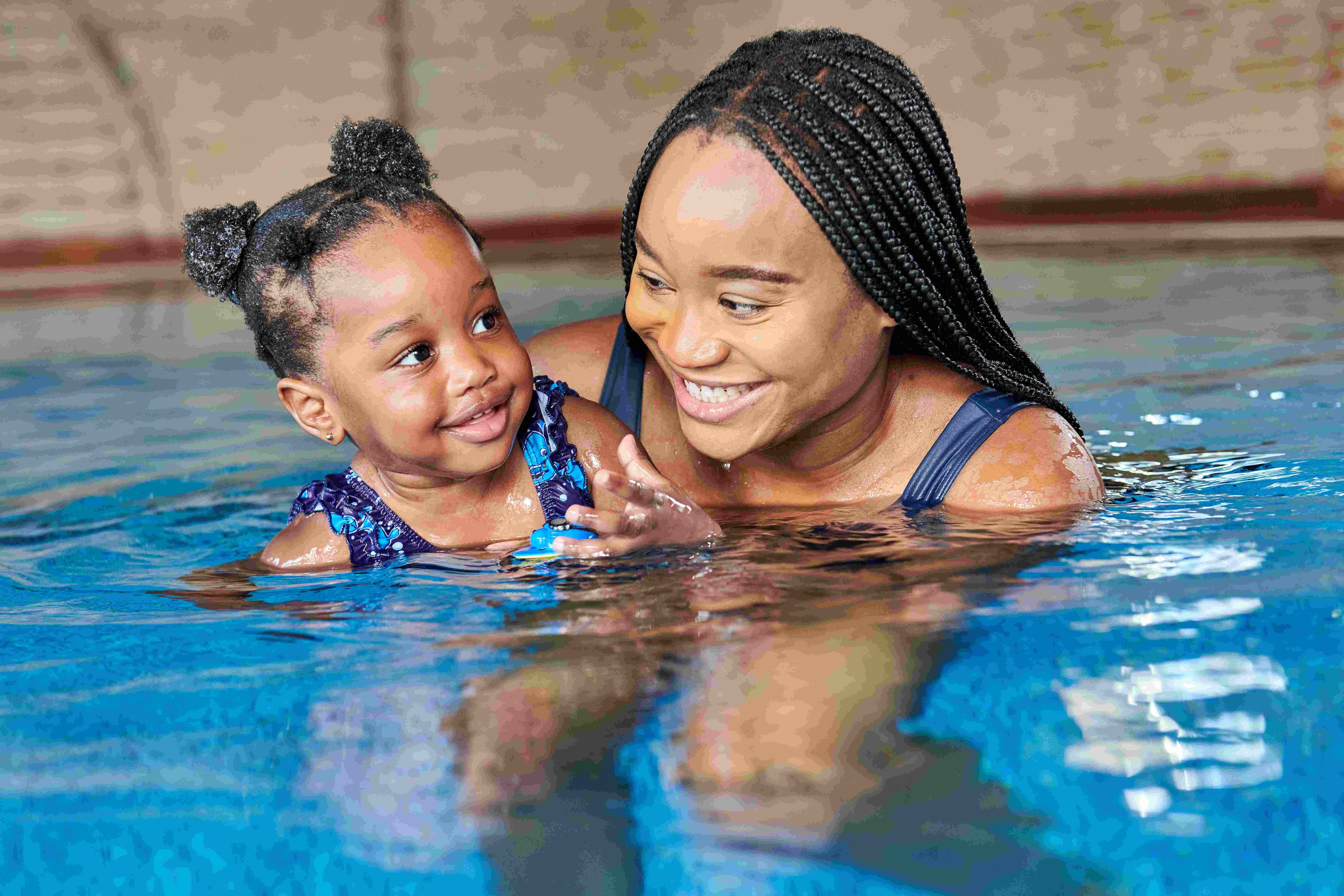 water babies mum with daughter in the swimming pool